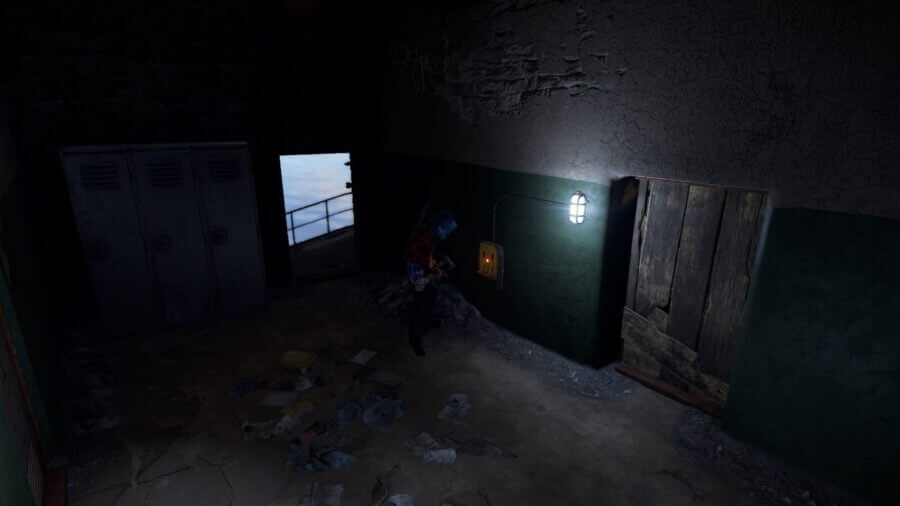 Just entering the next section you'll find the hallway which also reveals the first door we passed when running up the initial dock stairs. This is where the second light switch is located.