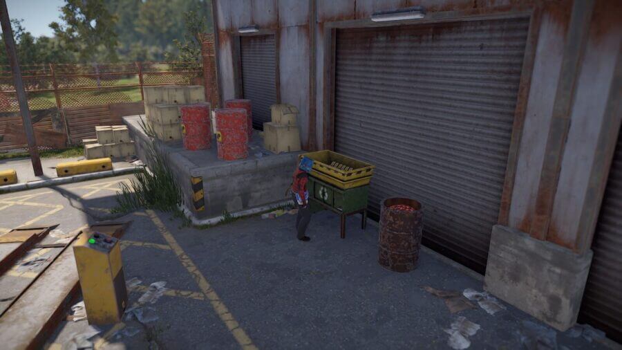 Located in the middle of the monument you'll find a recycler and next to it several crude oil barrels.