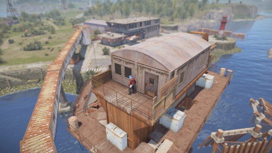 At the top of the rusty tower you can jump up on the railing to climb on the roof of this building to get into a secret ledge on the other side. Very safe to AFK at for a bit or hide in general.