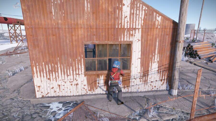 You can use these windows on either side of the main building to look into the interior in case there's loot or an enemy inside.