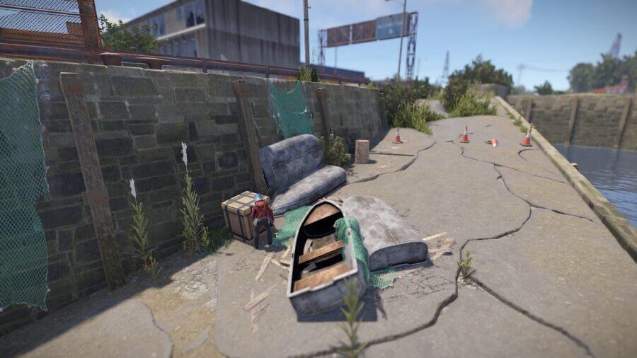 Going down the large ramp you will find a crate and barrel spawn next to these unusable boats.